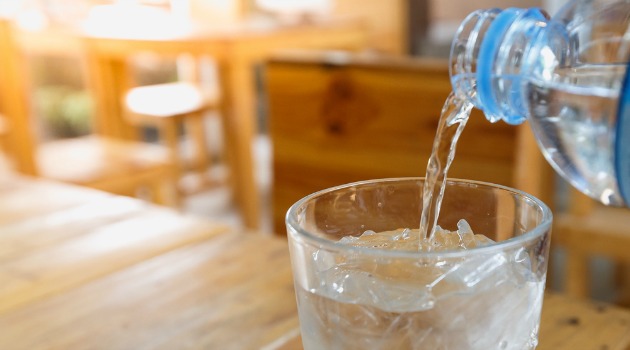 Pouring a glass of water