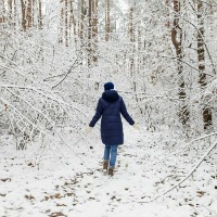 woman walking in winter countryside