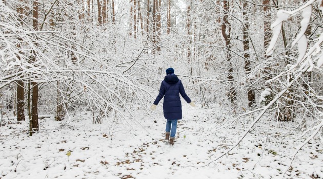 woman walking in winter countryside