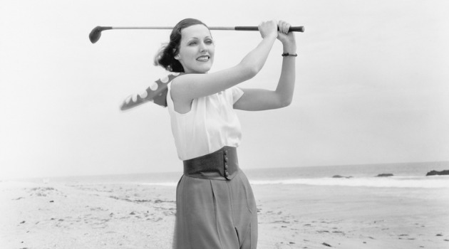 woman playing golf