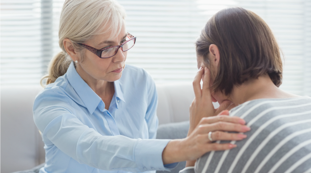 woman talking to therapist