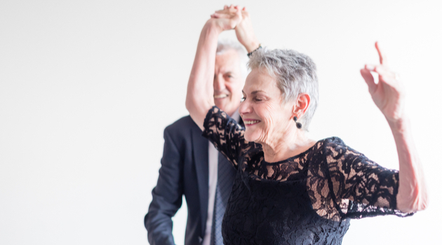 senior woman dancing in formal dress