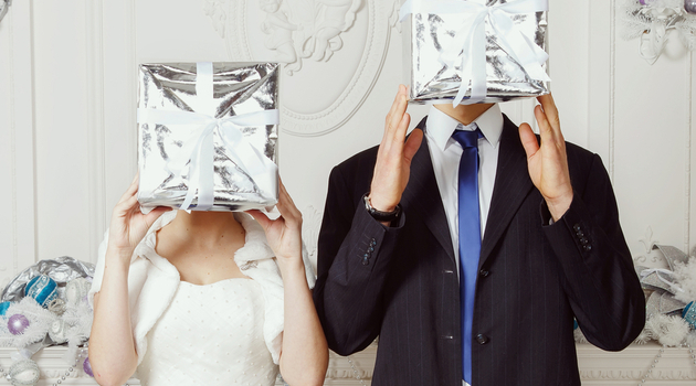 /cms/uploads/GN_Images/content/life-and-style/relationships/all-bridegroomholdinggiftsoverfaces.jpg