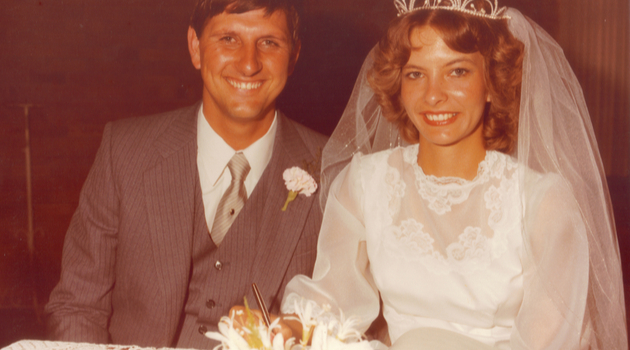 vintage newlyweds signing forms