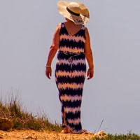 plus size woman wearing maxi dress