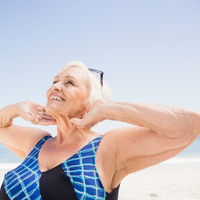 senior plus size woman on beach