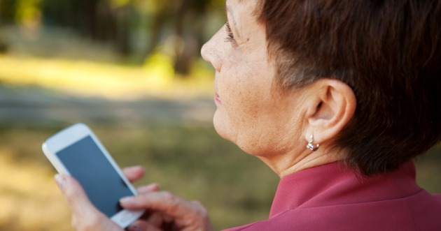 woman holding mobile phone